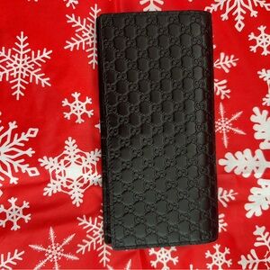 Gucci Slim Wallet, Embossed GG Guccissima Pattern, Black Leather